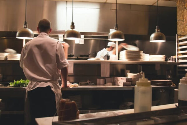 chef standing in restaurant kitchen